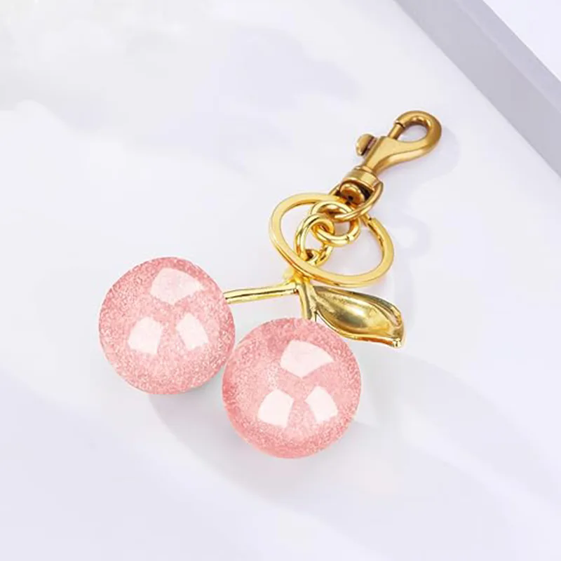 প্রতিদিনের ফ্যাশন প্রভাবের জন্য কীভাবে একটি ব্যাগ চার্ম চয়ন এবং স্টাইল করবেন